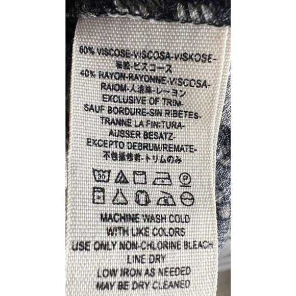 FREE PEOPLE All The Right Ruffles Romper in Black Raven Combo. Size Small - Picture 9 of 11